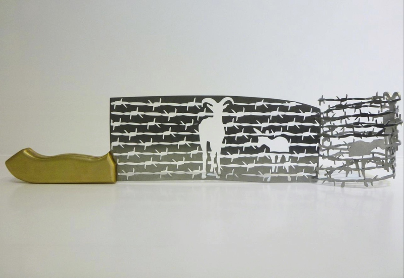 Illustration for article titled Intricate shadow silhouettes carved out of butcher's knife blades